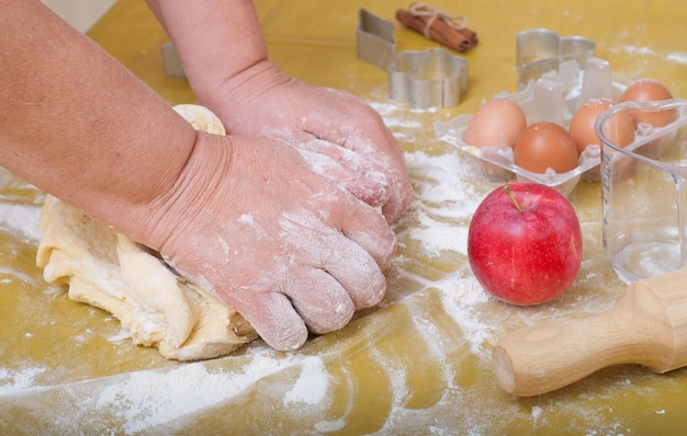 hands preparing dough